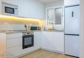 Fridge, microwave, oven, coffee/tea maker