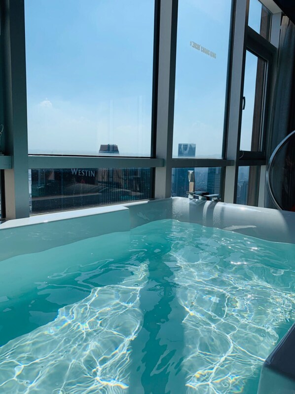 Comfort Double Room, River View | Bathroom | Separate tub and shower, deep soaking tub, rainfall showerhead - m58 Sky Sunset Hotel (Chongqing)