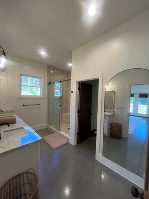 Shower, towels, soap, toilet paper