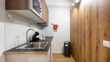 Fridge, microwave, coffee/tea maker, toaster