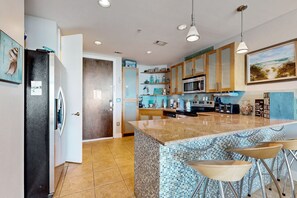 Fridge, microwave, oven, stovetop - Enchanting Gulf front condo w/spacious balcony, kitchen, shared pool & hot tub (Galveston)