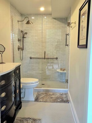 Shower, hair dryer, towels, soap