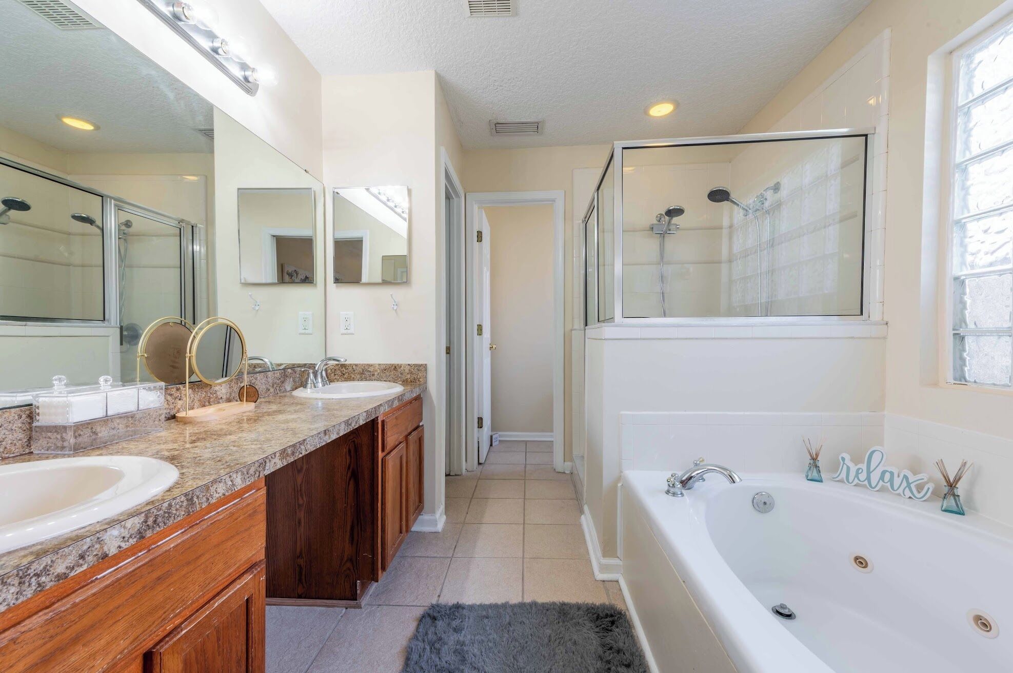 Shower, jetted tub, hair dryer, towels