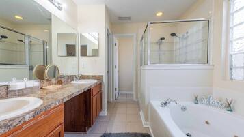 Shower, jetted tub, hair dryer, towels