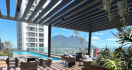 Elegant loft apt Santa Lucia king size bed, swim pool, gym, parking, kids club