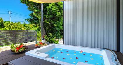 1-building rental Suppai Resort Okinawa with Jacuzzi, conveniently located 3 minutes by car from Churaumi Aquarium.