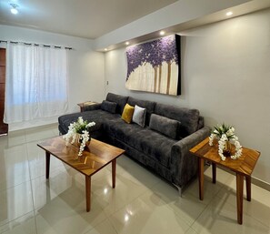 Appartement Confort, patio | Coin séjour