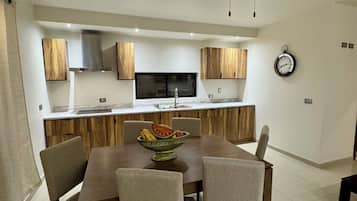Departamento Confort, vista a la ciudad | Cocina privada