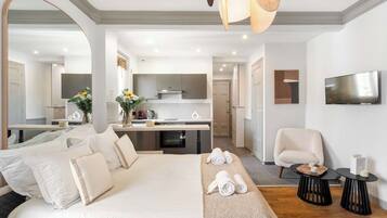 1 bedroom, desk, iron/ironing board, travel crib