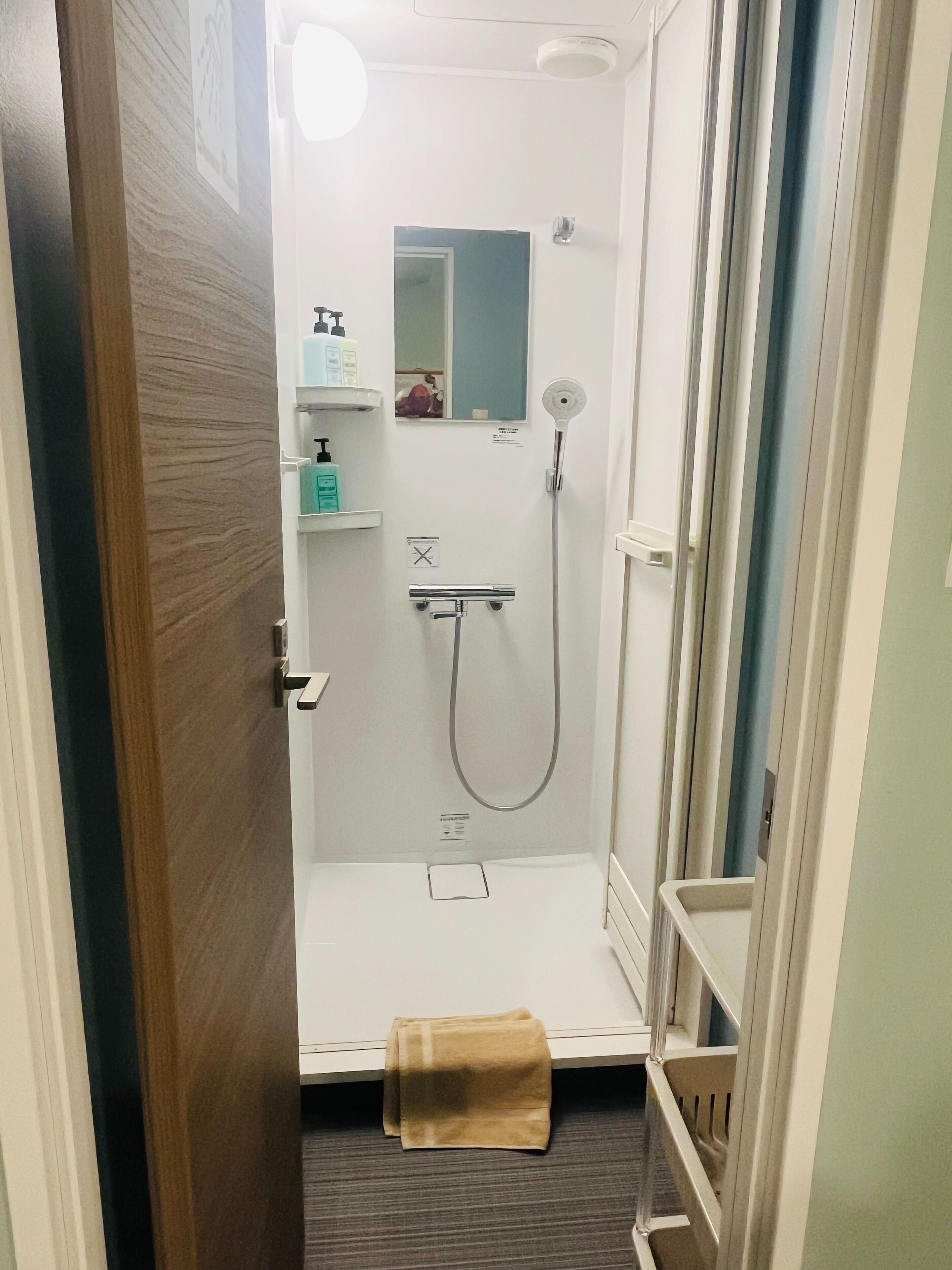 Shower, free toiletries, hair dryer, slippers