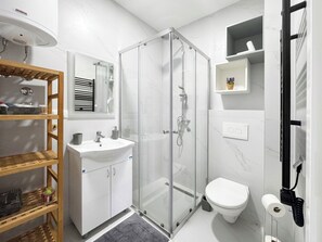Hair dryer, towels, soap, shampoo
