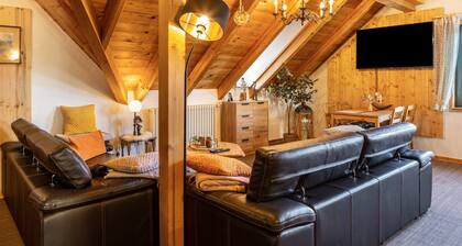 Attic Apartment in Country House Style