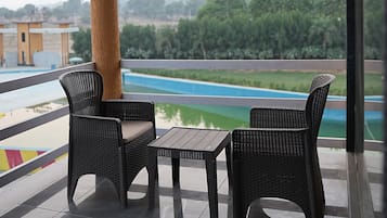 Deluxe Room, 1 Double Bed, Pool View | Balcony