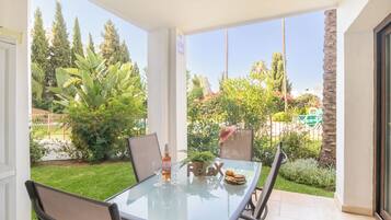 Family Apartment, Multiple Bedrooms, Mountainside (Mijas Golf 1-Bedr, Terrace & shared) | Outdoor dining