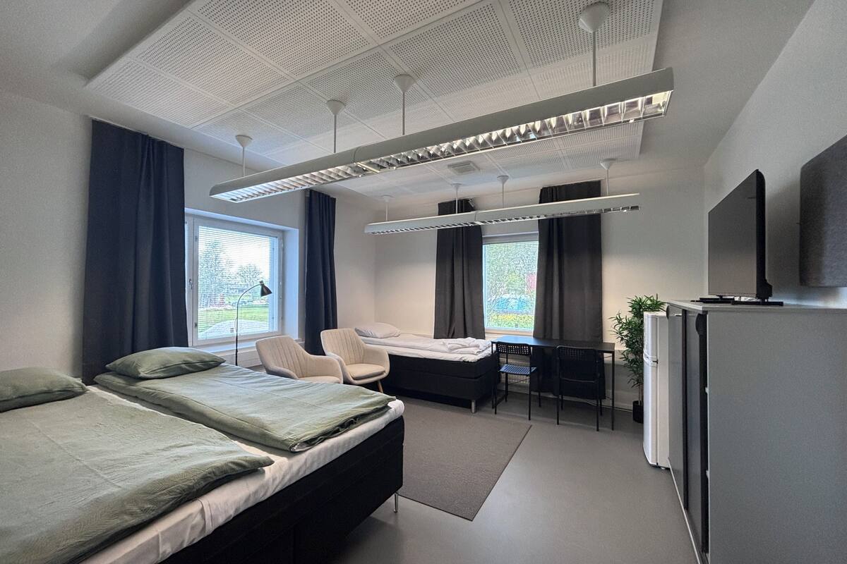 Standard Triple Room, Courtyard View | Desk, laptop workspace, blackout drapes, soundproofing