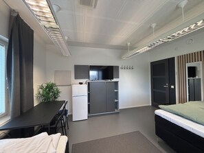 Desk, laptop workspace, blackout curtains, soundproofing