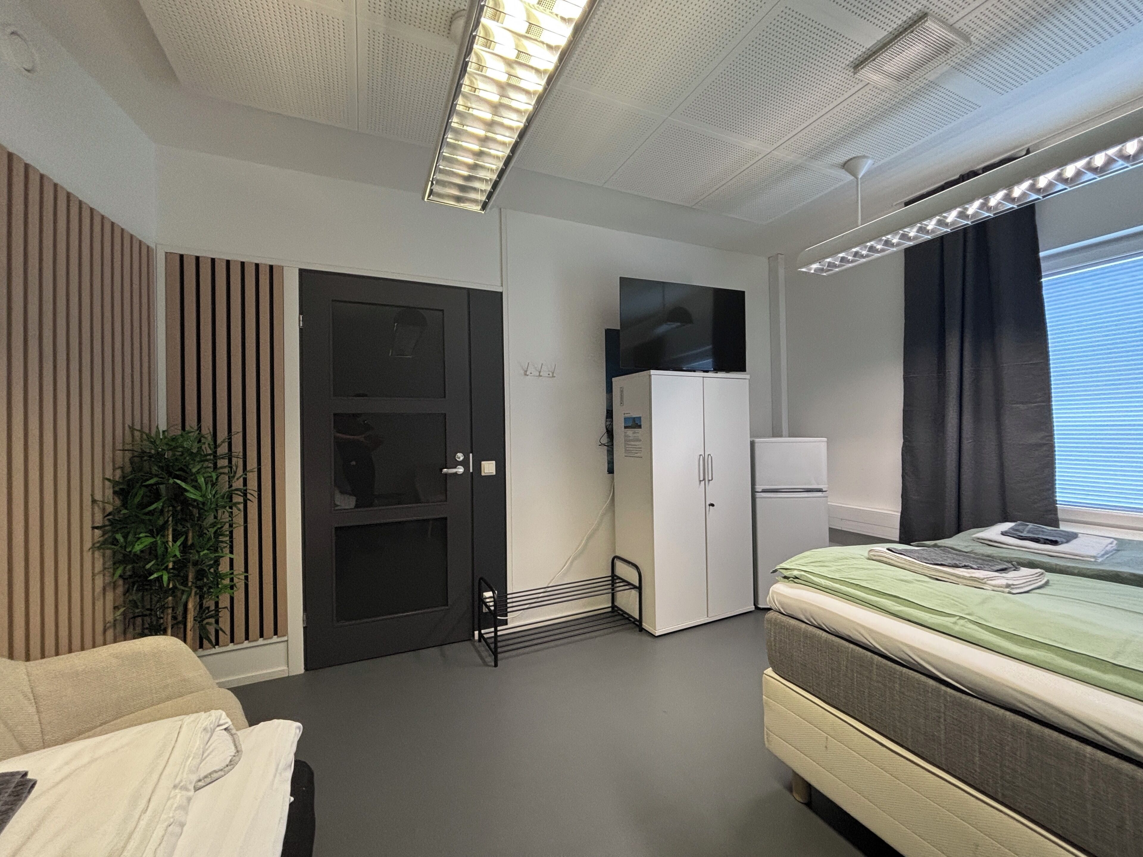 Standard Triple Room | Desk, laptop workspace, blackout drapes, soundproofing