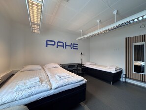 Standard Triple Room, Courtyard View | Desk, laptop workspace, blackout drapes, soundproofing