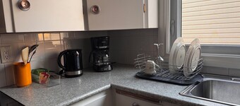 Cozy 2BR in Winnipeg. Near airport, food, transport. Your home away from home.