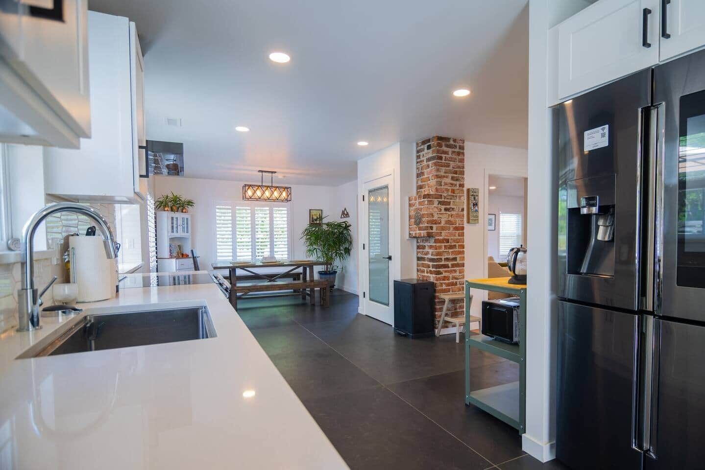Expansive kitchen awaits your gourmet creations with the latest appliances and equipment