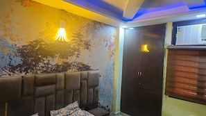 Luxury Apartment, 1 Bedroom, Balcony, City View | Desk, laptop workspace, soundproofing, iron/ironing board