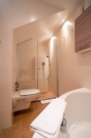 Shower, hair dryer, towels, soap