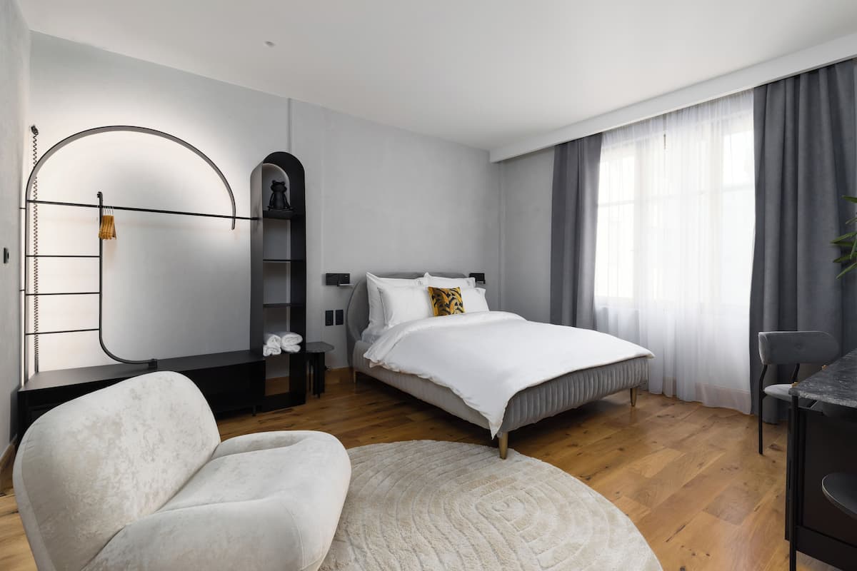 Standard Room, Courtyard View, Corner | Laptop workspace, soundproofing, iron/ironing board, free WiFi