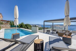 Seasonal outdoor pool, a heated pool - Luxury Seaview Villa Rosciola (Crikvenica)