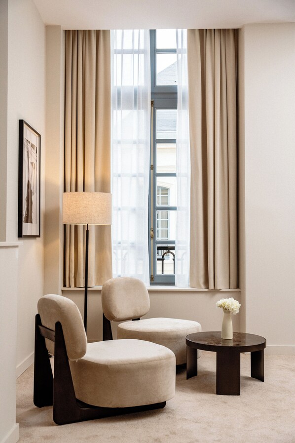 Royal Suite, Courtyard View | Living area | 15-inch flat-screen TV with digital channels
