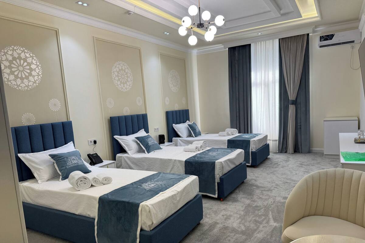 Deluxe Triple Room | Blackout drapes, soundproofing, iron/ironing board (on request)