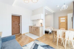 Suite junior, balcón | Área de sala de estar