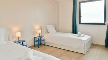 3 slaapkamers, een strijkplank/strijkijzer, beddengoed