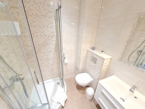 Hair dryer, towels, soap, toilet paper