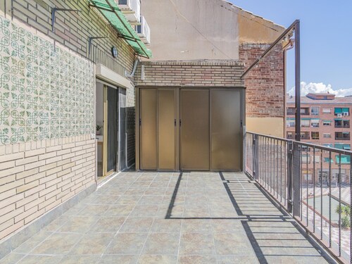 2-Bedroom Retreat with Terrace in Granada - Steps from Metro and Bus
