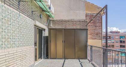 2-Bedroom Retreat with Terrace in Granada - Steps from Metro and Bus