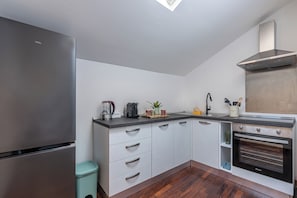 Condo, 3 quartos | Cozinha privada | Geladeira, fogão, cooktop, máquina de café expresso