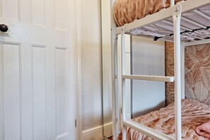 4 bedrooms, desk, iron/ironing board, travel cot