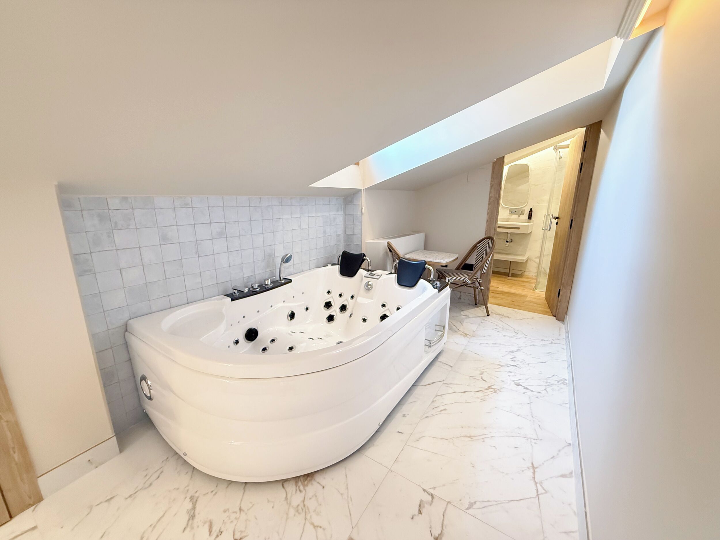 Down duvets, memory-foam beds, desk, laptop workspace