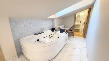 Down duvets, memory-foam beds, desk, laptop workspace