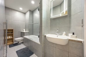 Shower, hair dryer, towels, soap