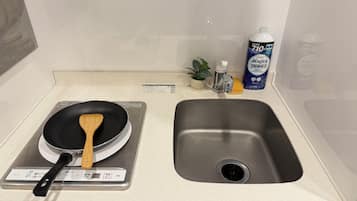 Fridge, microwave, cookware/dishes/utensils