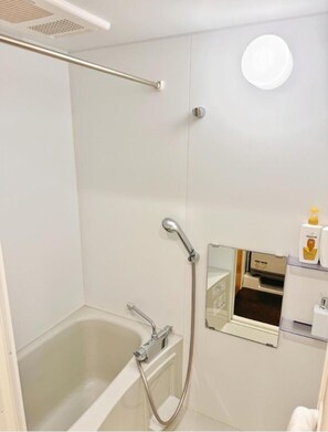 Standard Triple Room | Bathroom | Combined shower/tub, hair dryer, towels, soap