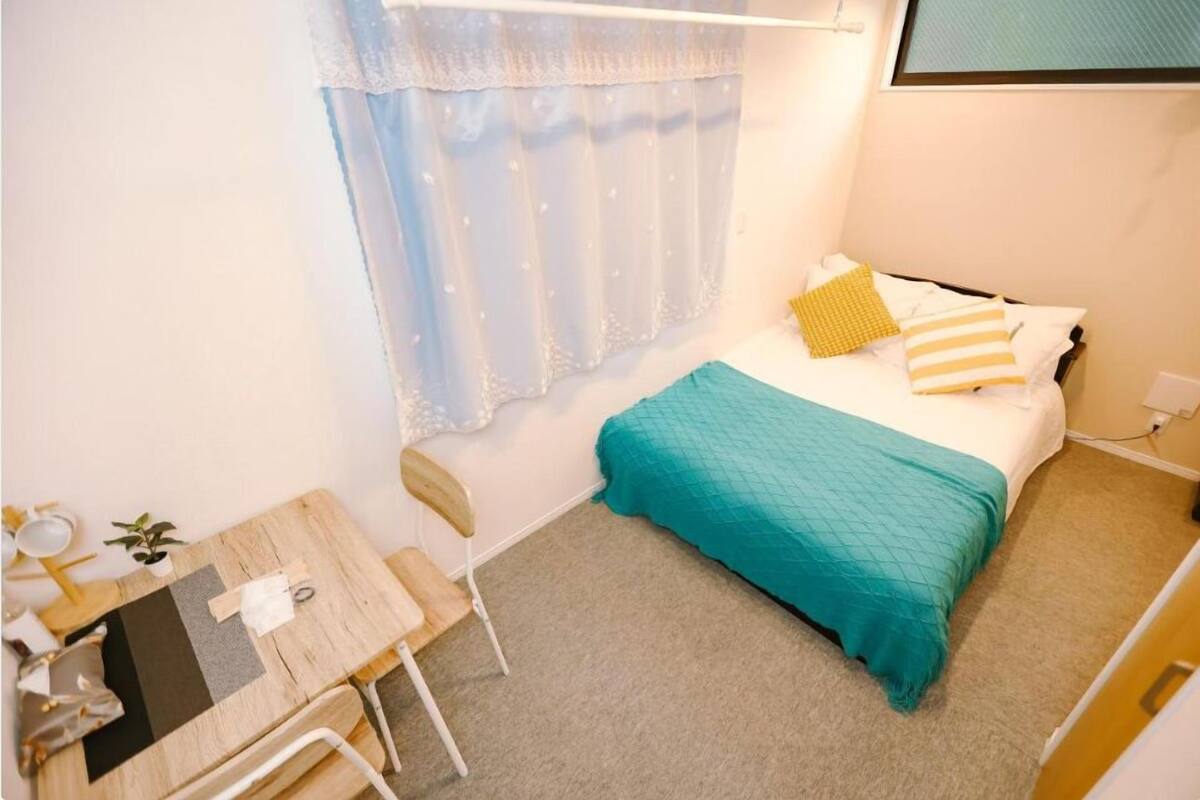 Standard Triple Room | Desk, laptop workspace, blackout drapes, free WiFi