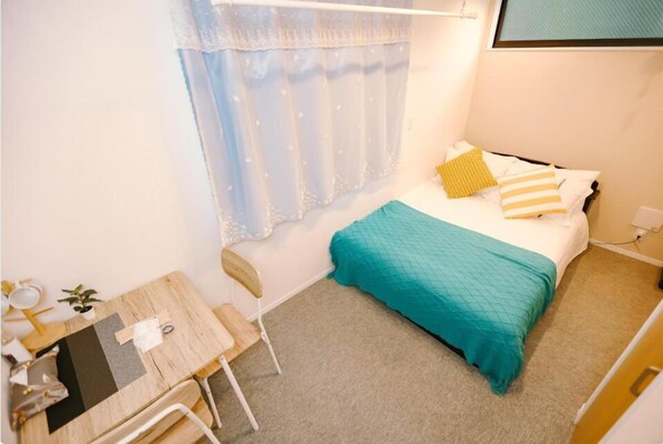 Standard Triple Room | Desk, laptop workspace, blackout drapes, free WiFi