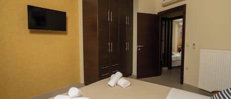 Apartamento, vista para a cidade | Cortinas blackout, quartos à prova de som, ferros/tábuas de passar roupa