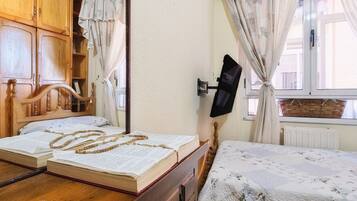 4 slaapkamers, een strijkplank/strijkijzer, wifi, beddengoed