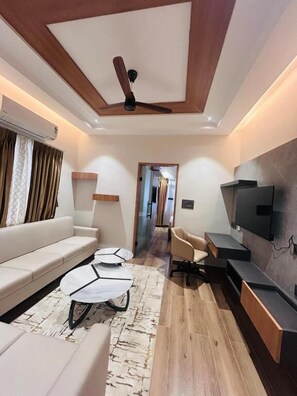 Suite executiva | Sala d'estar | Televisor LED 