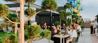 Near RiNo Arts District + Kitchen. Bar. Playroom.