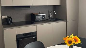 Luxury Apartment, Non Smoking | Private kitchen | Fridge, microwave, stovetop, cookware/dishes/utensils