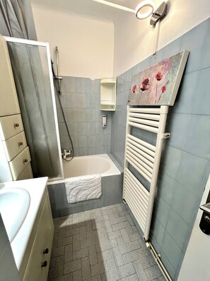 Hair dryer, towels, soap, toilet paper